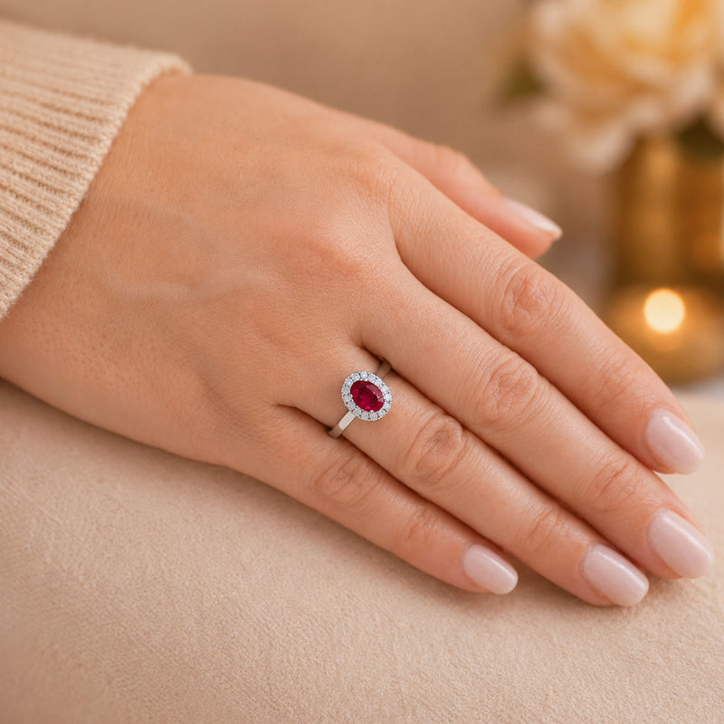 Platinum Oval Cut Ruby And Diamond Halo Ring