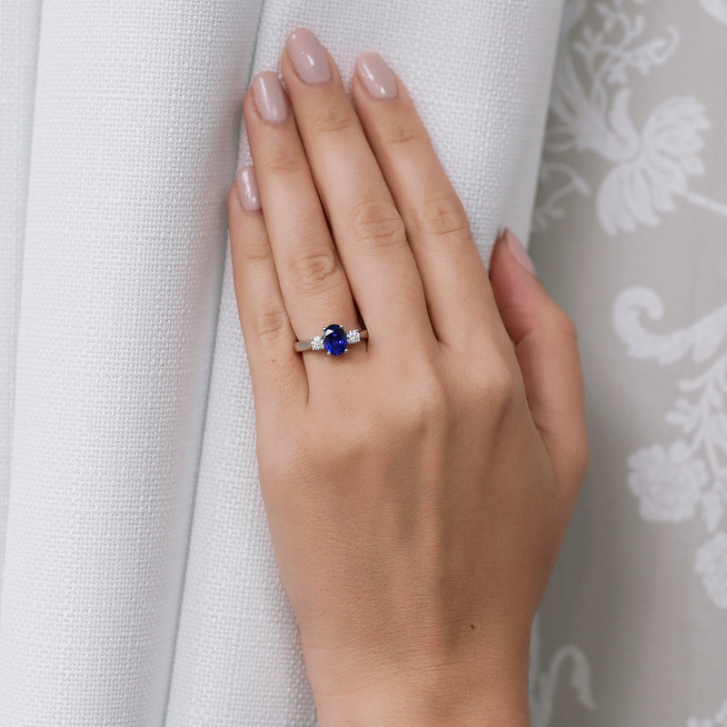 Berry's Platinum Oval Blue Sapphire & Round Brilliant Cut Diamond Three Stone Ring - Berry's Jewellers