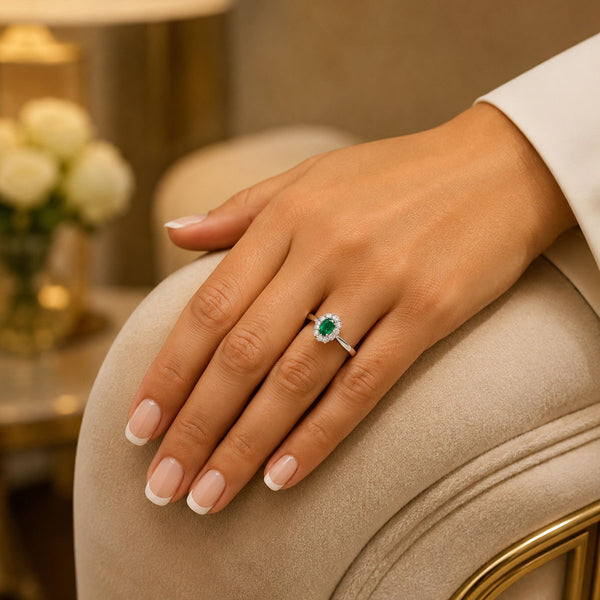 Platinum Oval Cut Emerald And Diamond Cluster Ring