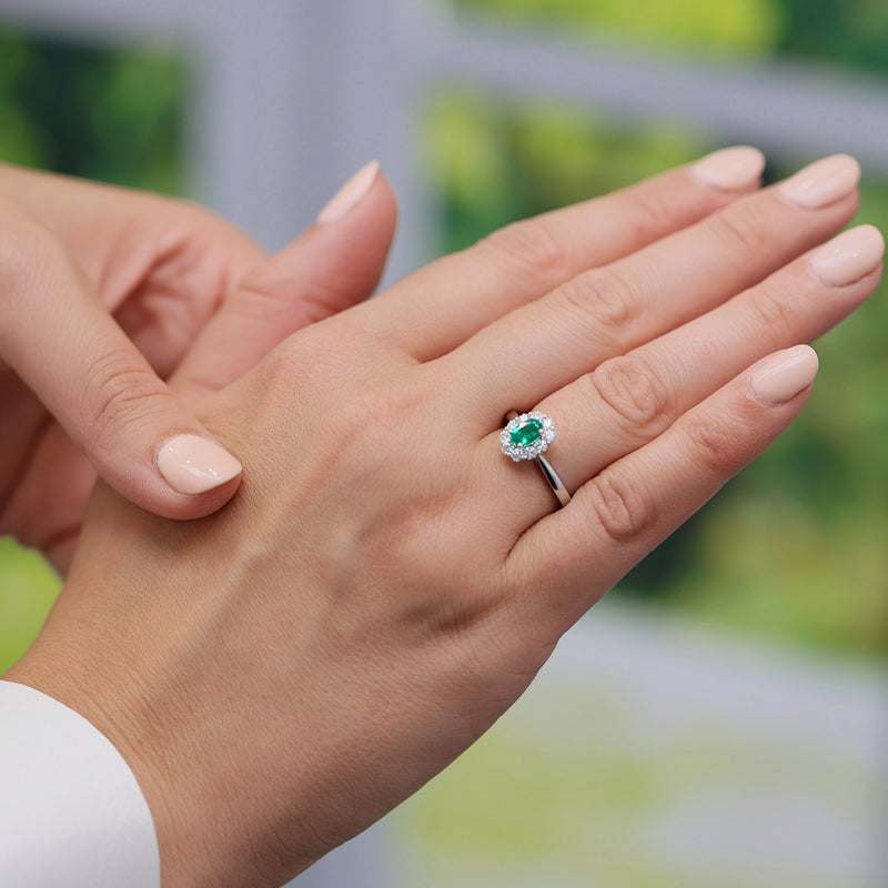 Berry's Platinum Oval Cut Emerald And Diamond Cluster Ring - Berry's Jewellers