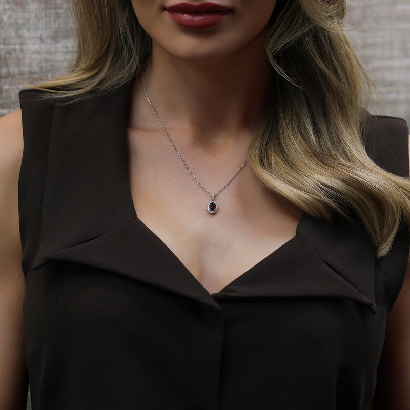 Platinum Oval Cut Ruby And Diamond Cluster Pendant