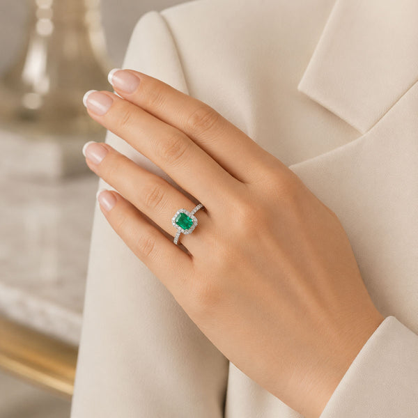 Platinum Emerald And Diamond Halo Ring With Diamond Shoulders