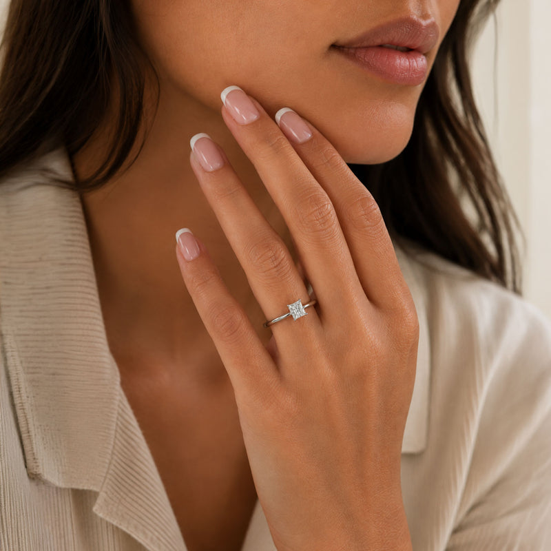 Platinum Princess Cut Four Claw Solitaire Engagement Ring