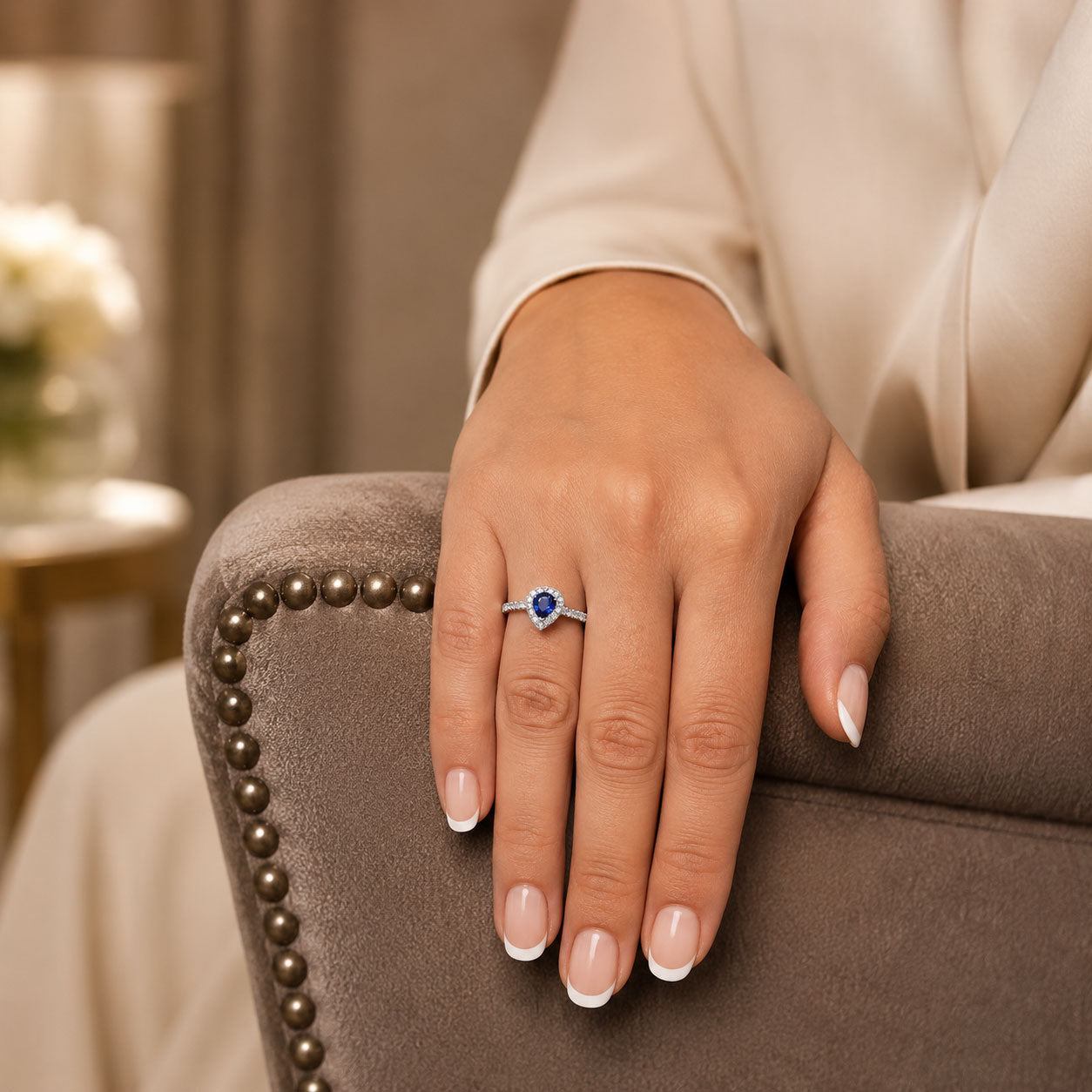 Platinum Pear Sapphire Ring With Diamond Halo Surround And Shoulders