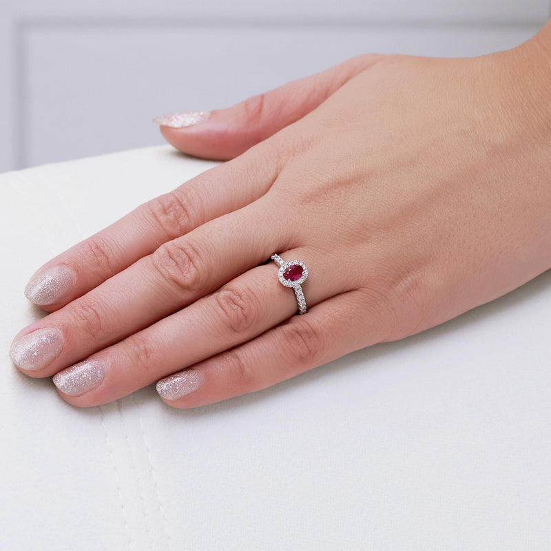 Berry's Platinum Oval Cut Ruby In a Diamond Halo Setting With Diamond Set Shoulders - Berry's Jewellers