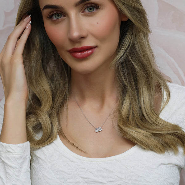 18ct White Gold Toi Et Moi Emerald And Pear Cut Diamond Two Stone Halo Pendant