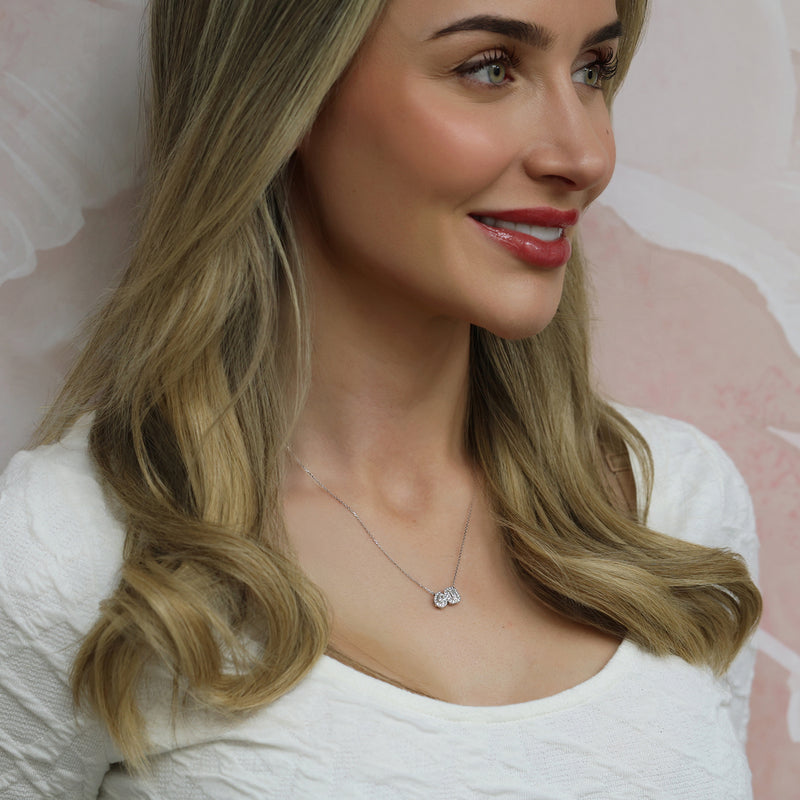 18ct White Gold Toi Et Moi Emerald And Pear Cut Diamond Two Stone Halo Pendant