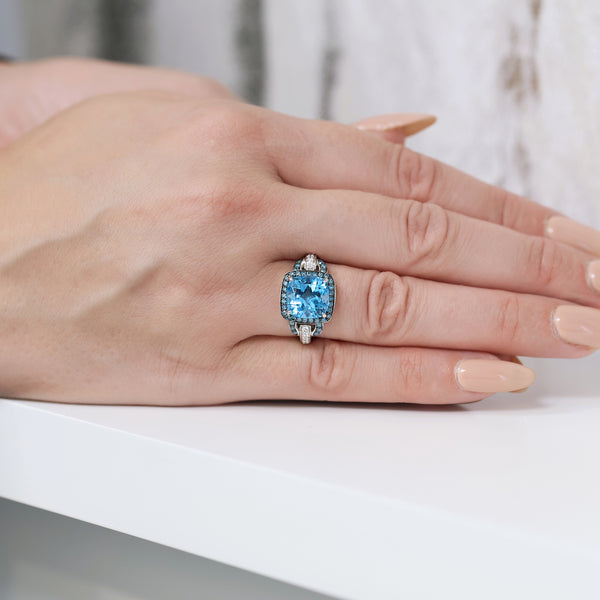 Berry's 18ct White Gold Cushion Cut Blue Topaz And Round Brilliant Diamond Fancy Mount Dress Ring - Berry's Jewellers