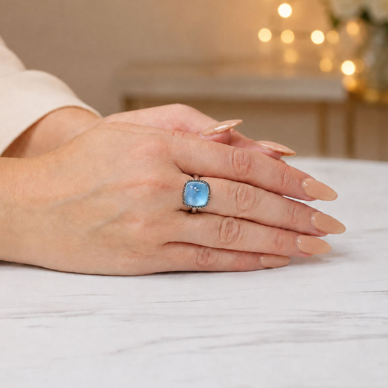18ct White Gold Cabochon Cut Blue Topaz & Blue Diamond Halo Dress Ring