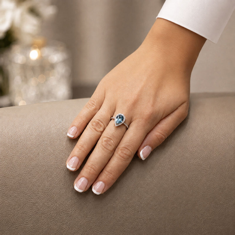 18ct White Gold Pear Cut Aquamarine Ring With Claw Set and Diamond Shoulders