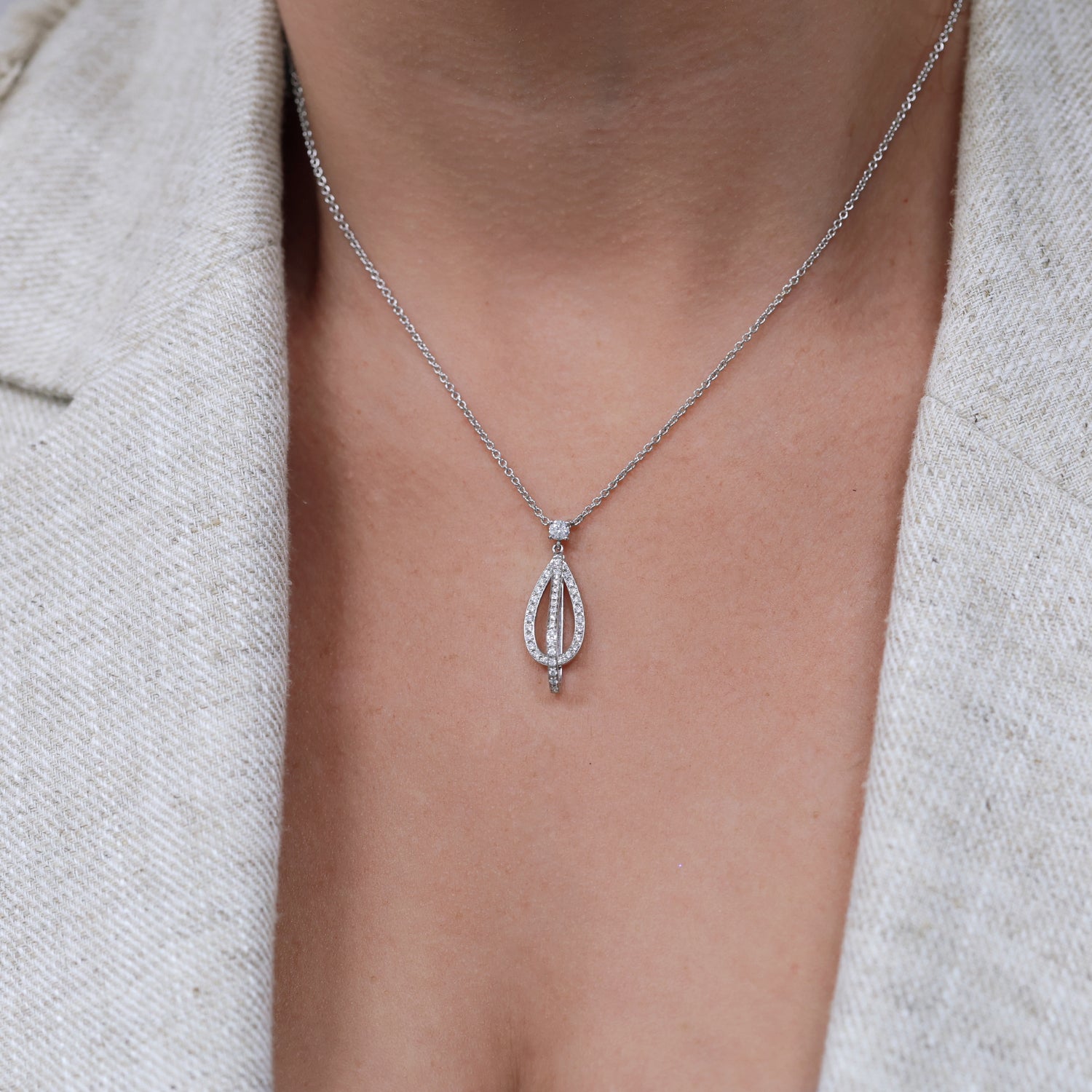 Berry's 18ct White Gold Round Brilliant Cut Tear Drop Overlapping Pendant - Berry's Jewellers