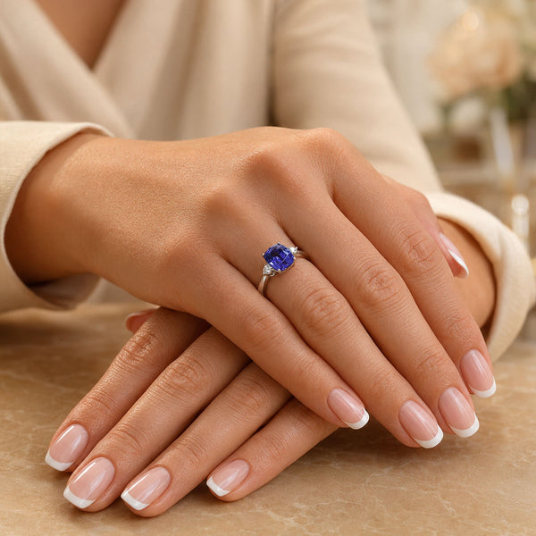 Platinum Cushion Cut Tanzanite And Diamond Three Stone Ring