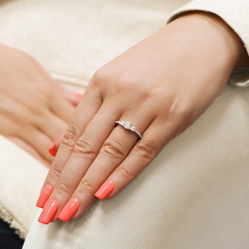 Berry's Platinum Round Brilliant And Princess Cut Diamond Three Stone Engagement Ring - Berry's Jewellers