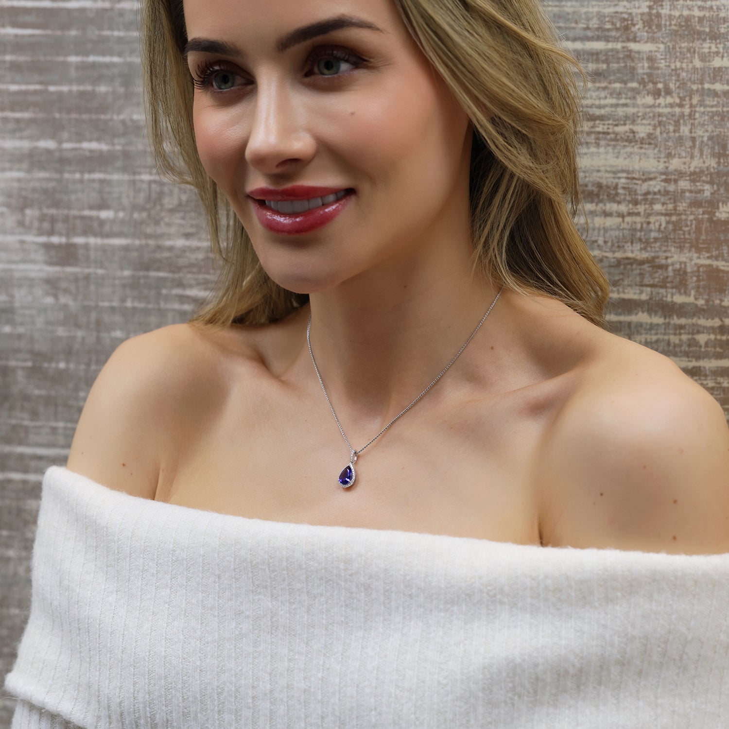 18ct White Gold Pear Shaped Tanzanite & Diamond Cluster Pendant