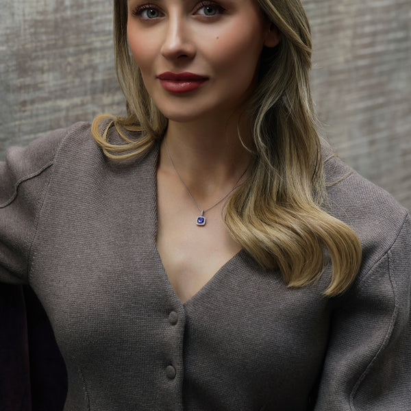 Berry's 18ct White Gold Cushion Cut Tanzanite And Diamond Halo Pendant With A Diamond Bale - Berry's Jewellers