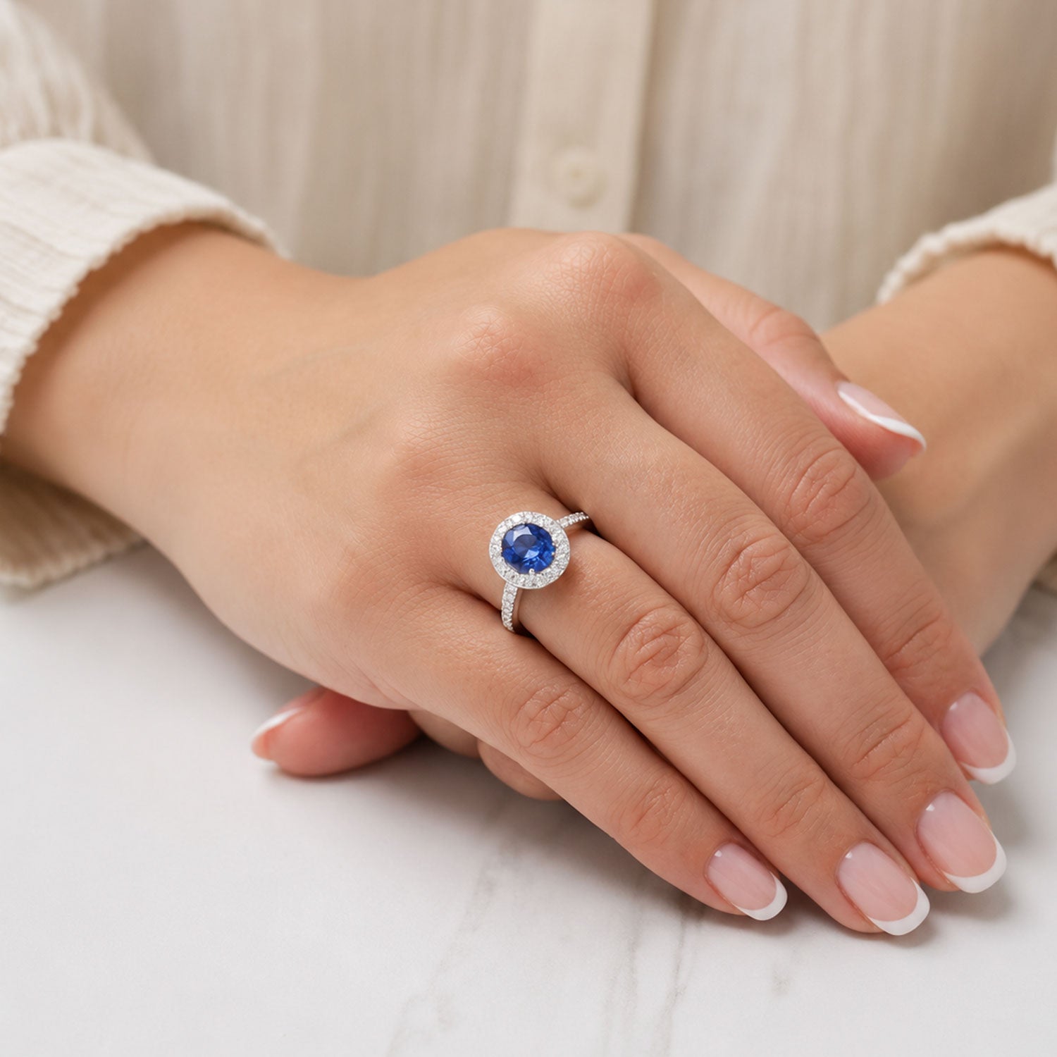 Platinum Oval Sapphire And Diamond Grain Set Halo Cluster Ring With Diamond Shoulders