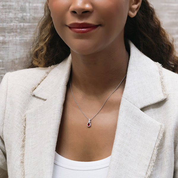 Berry's 18ct White Gold Pear Cut Ruby And Double Diamond Halo Fancy Surround Pendant - Berry's Jewellers