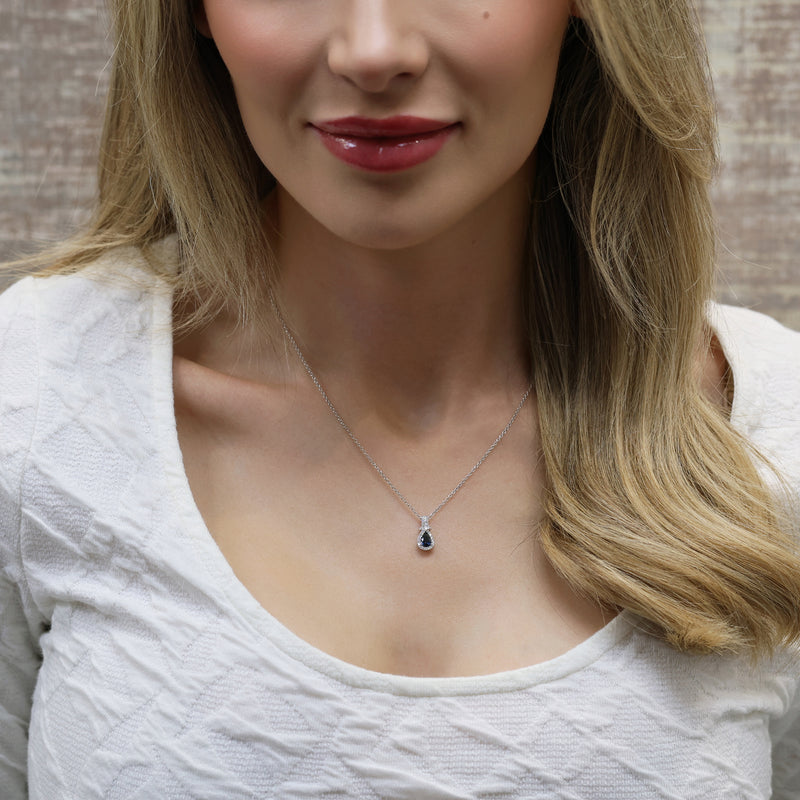 18ct White Gold Pear Shape Blue Sapphire & Round Brilliant Cut Diamond Halo Pendant