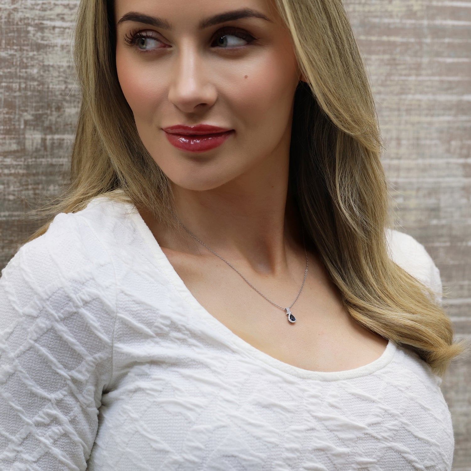 18ct White Gold Pear Shape Blue Sapphire & Round Brilliant Cut Diamond Halo Pendant