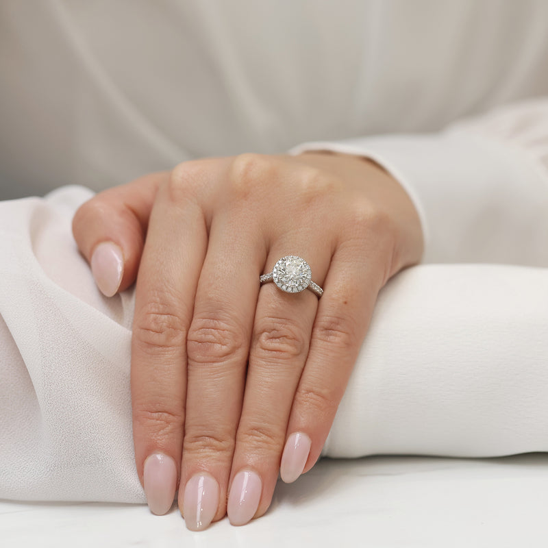 Platinum GIA Certificated Round Brilliant Cut Diamond Halo Ring and Diamond Set Shoulders