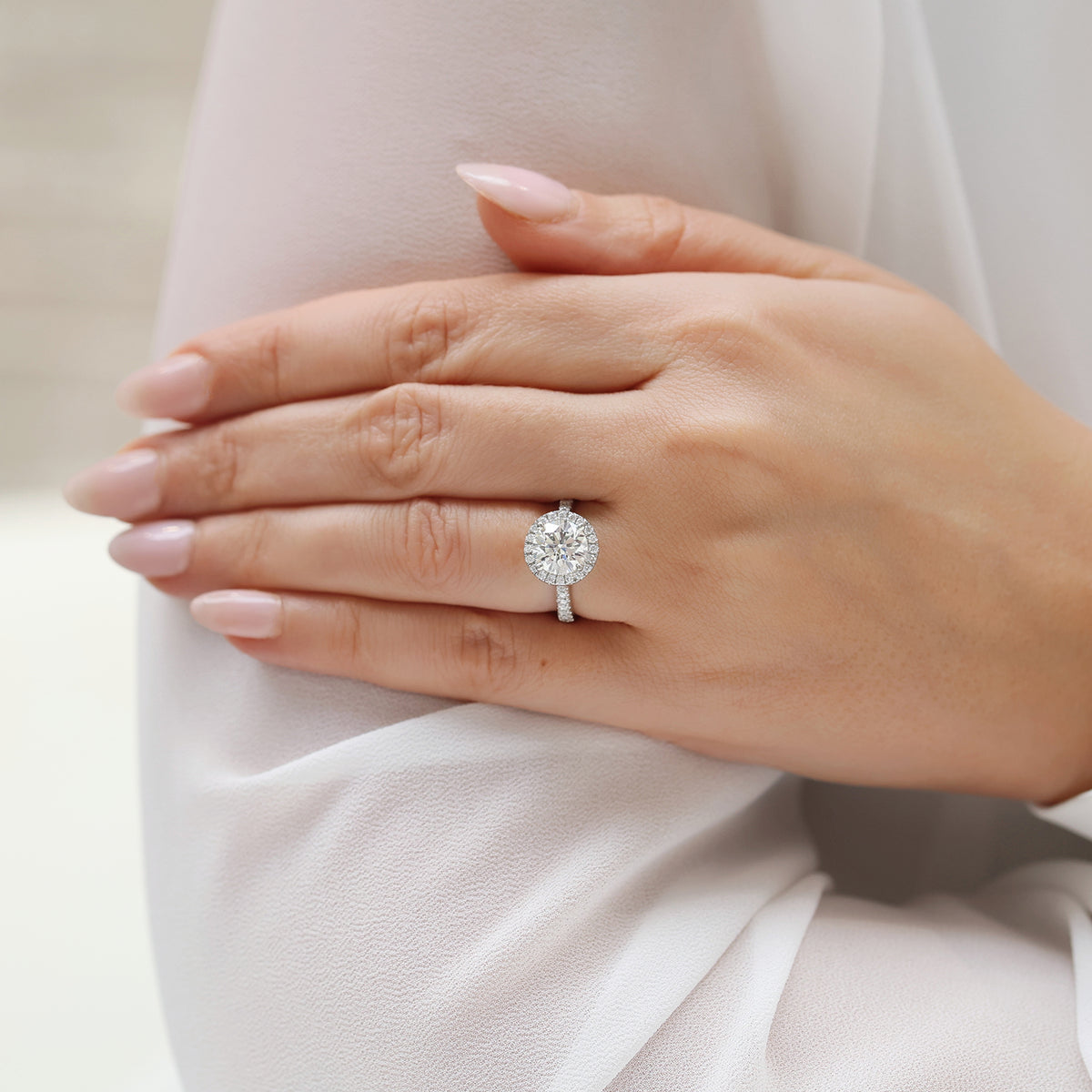 Berry's Platinum GIA Certificated Round Brilliant Cut Diamond Halo Ring and Diamond Set Shoulders - Berry's Jewellers