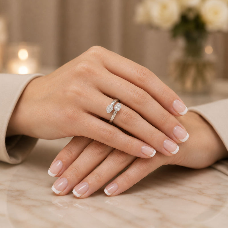 Platinum Pear Shape Diamond Cross Over Fancy Ring