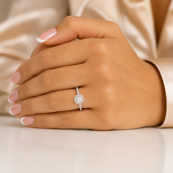 Platinum Round Brilliant Cut Diamond Ring With Diamond Halo and Channel Set Shoulders