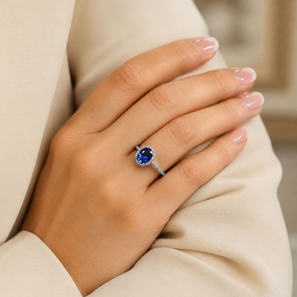 Platinum Oval Sapphire And Diamond Cluster Ring With Diamond Set Shoulders