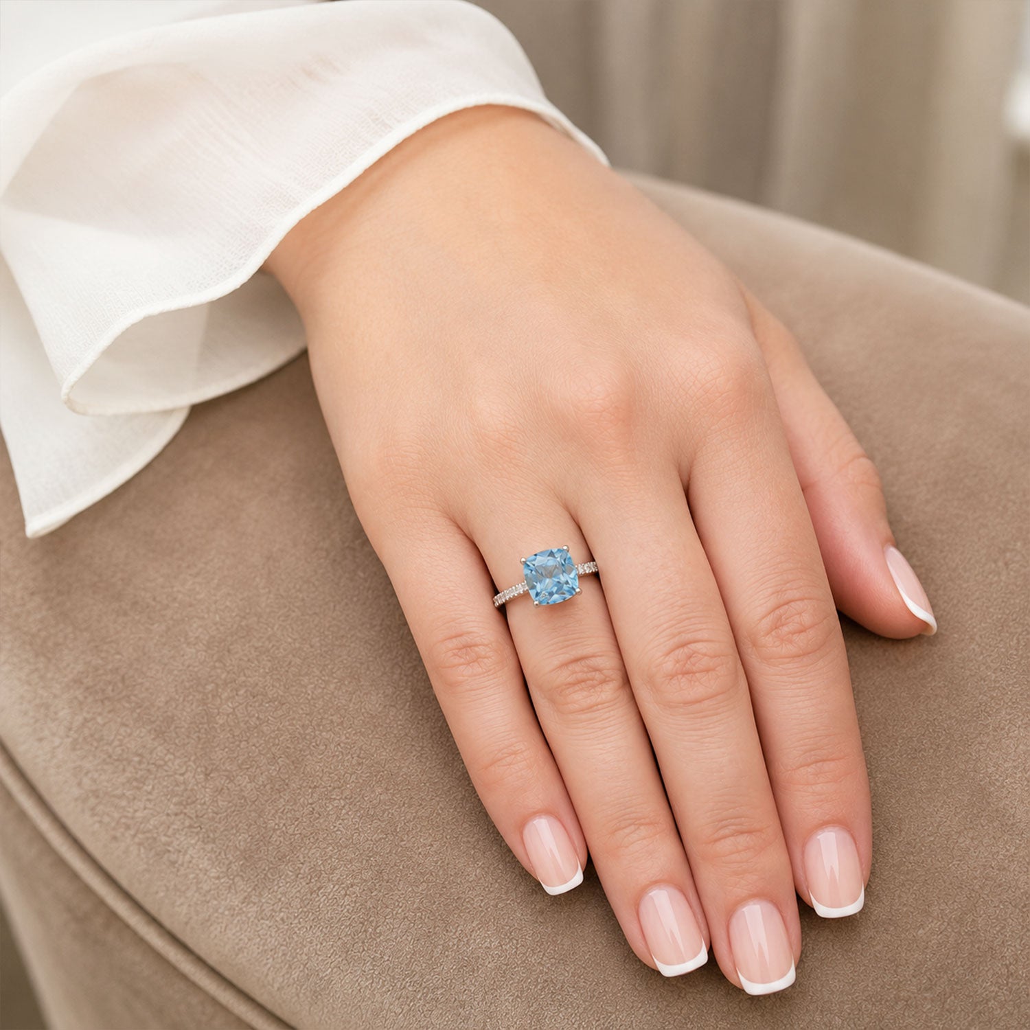 Platinum Cushion Cut Aquamarine Ring with Round Brilliant Diamond Set Shoulders