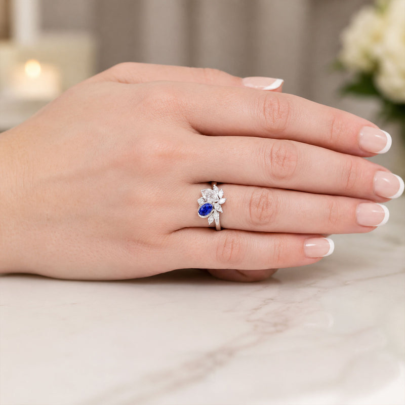 18ct White Gold Oval Tanzanite And Marquise Diamond Off Set Ring