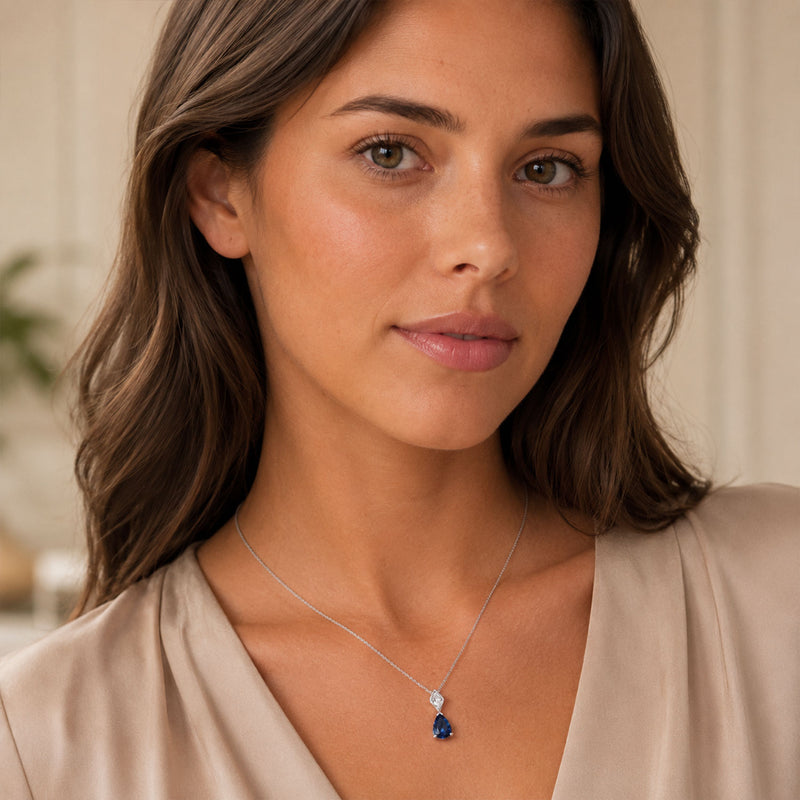 18ct White Gold Pear Sapphire And Diamond Drop Pendant