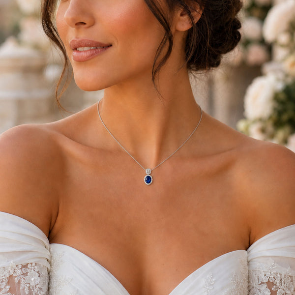 Berry's 18ct White Gold Oval Sapphire And Diamond Double Halo Pendant - Berry's Jewellers