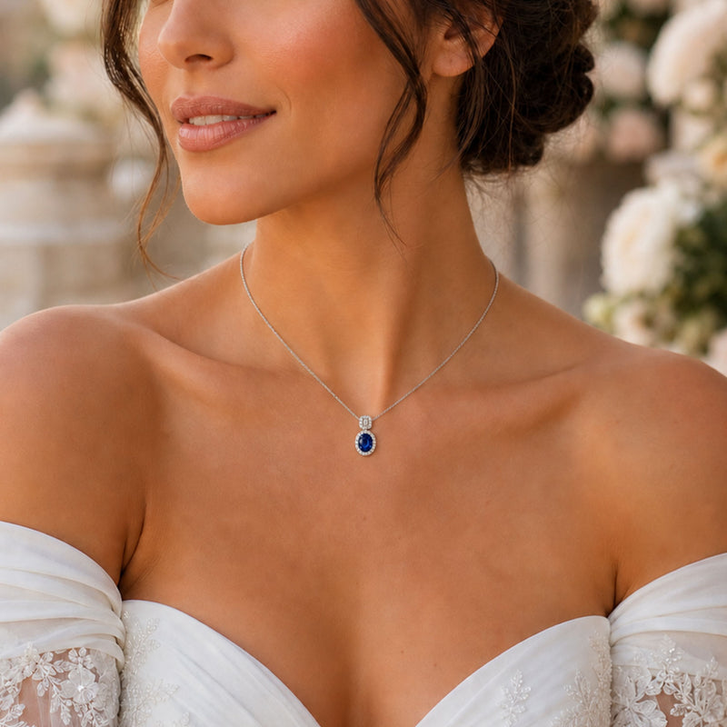 Berry's 18ct White Gold Oval Sapphire And Diamond Double Halo Pendant - Berry's Jewellers