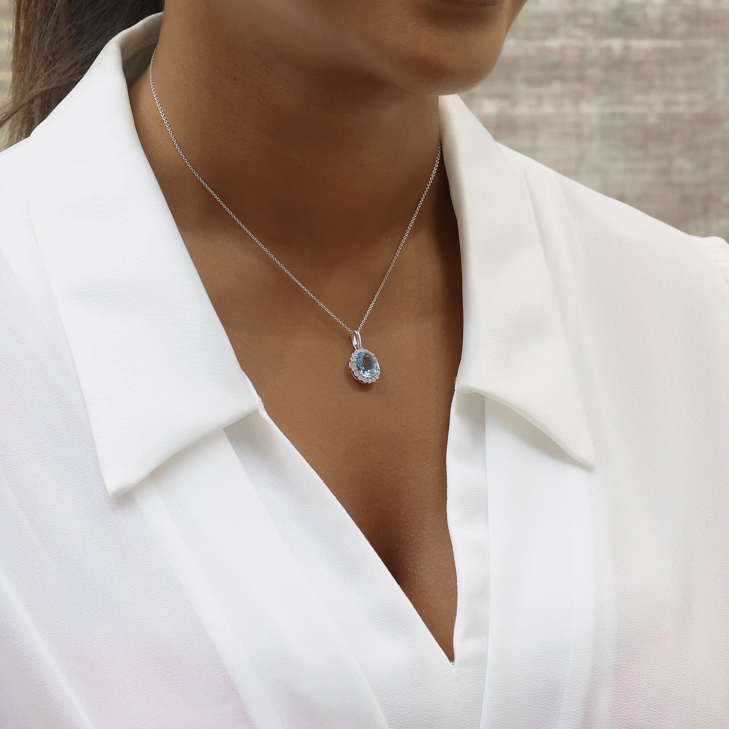 Berry's 18ct White Gold Oval Cut Aquamarine And Diamond Halo Pendant - Berry's Jewellers