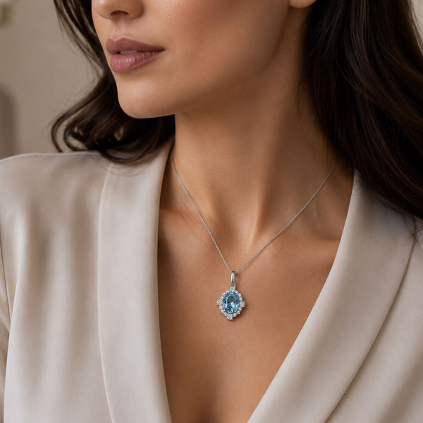 Berry's 18ct White Gold Oval Cut Aquamarine And Diamond Cluster Pendant - Berry's Jewellers