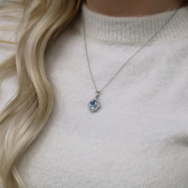 Berry's 18ct White Gold Oval Cut Aquamarine And Diamond Cluster Pendant - Berry's Jewellers