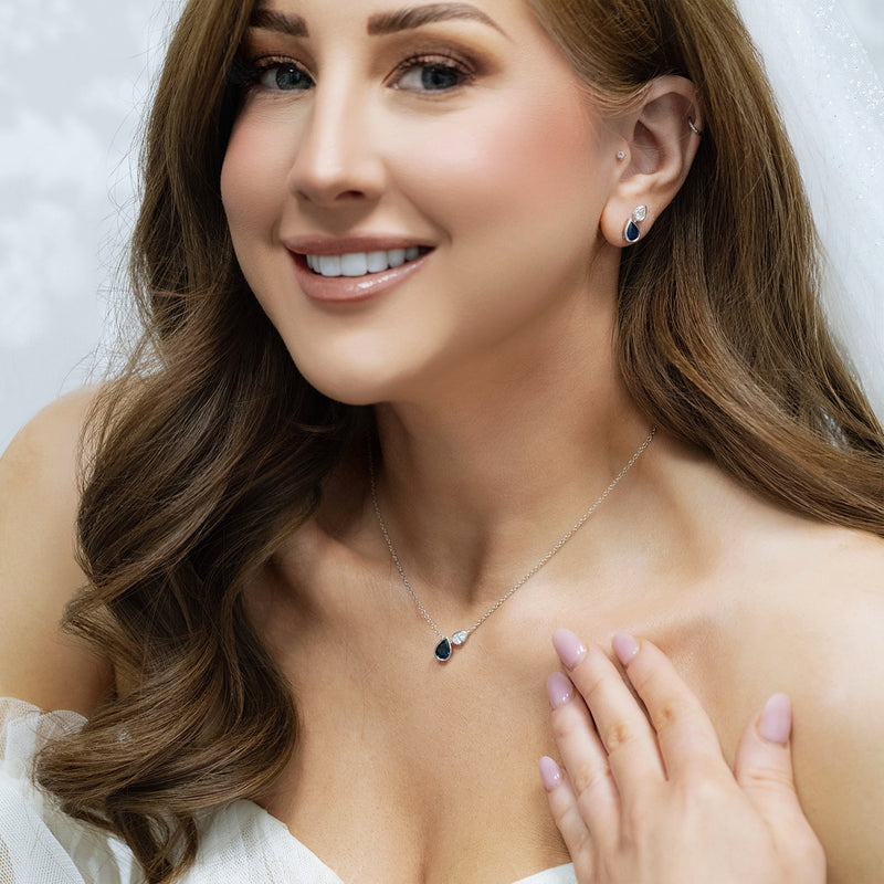 Berry's 18ct White Gold Pear Cut Sapphire And Diamond Rub Over Set Pendant - Berry's Jewellers