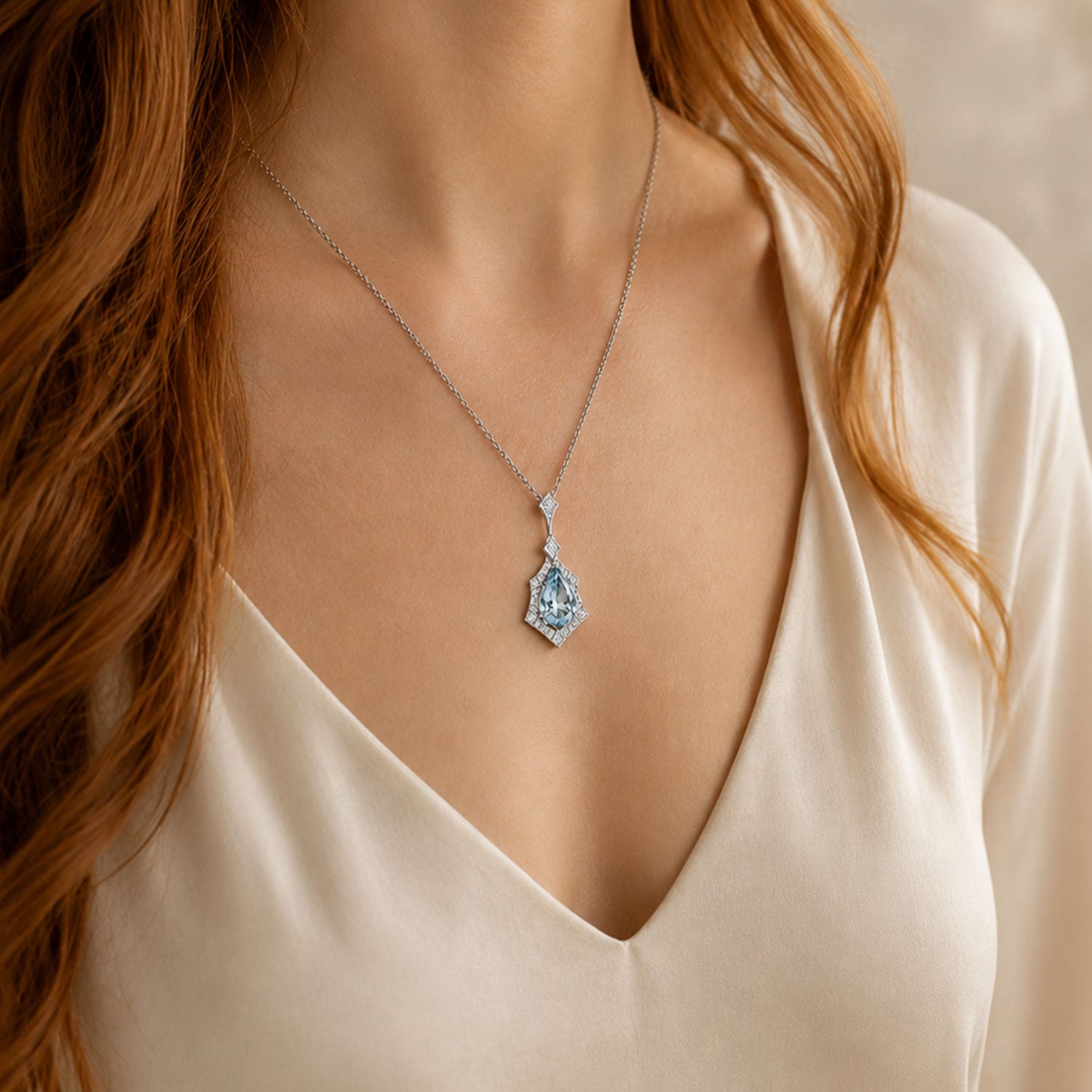 Berry's 18ct White Gold Pear Cut Aquamarine And Diamond Halo Pendant - Berry's Jewellers