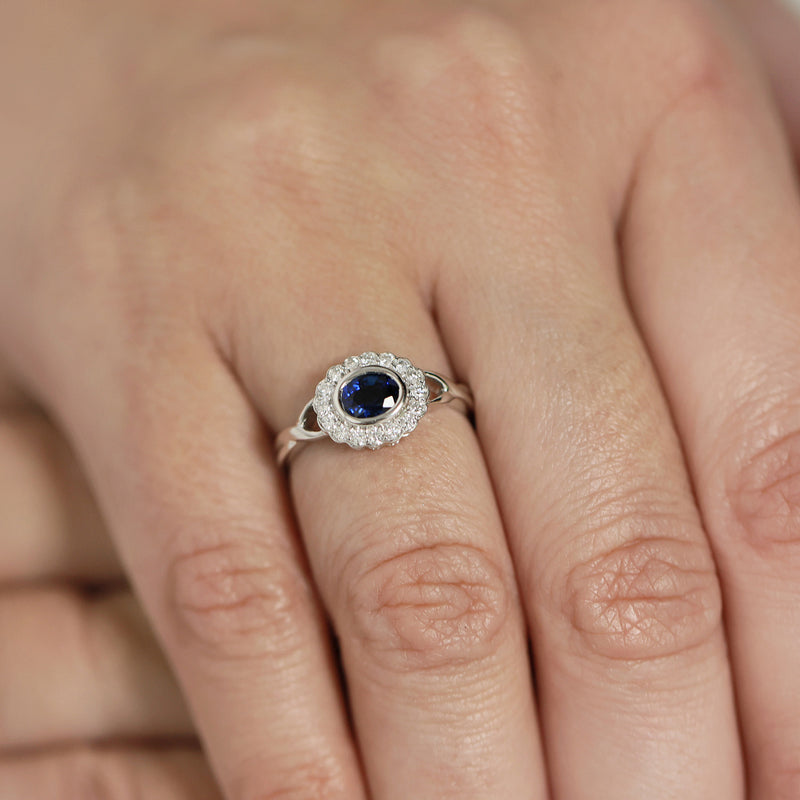Berry's 18ct White Gold Blue Sapphire and Brilliant Cut Diamond Rub Over Cluster Ring - Berry's Jewellers