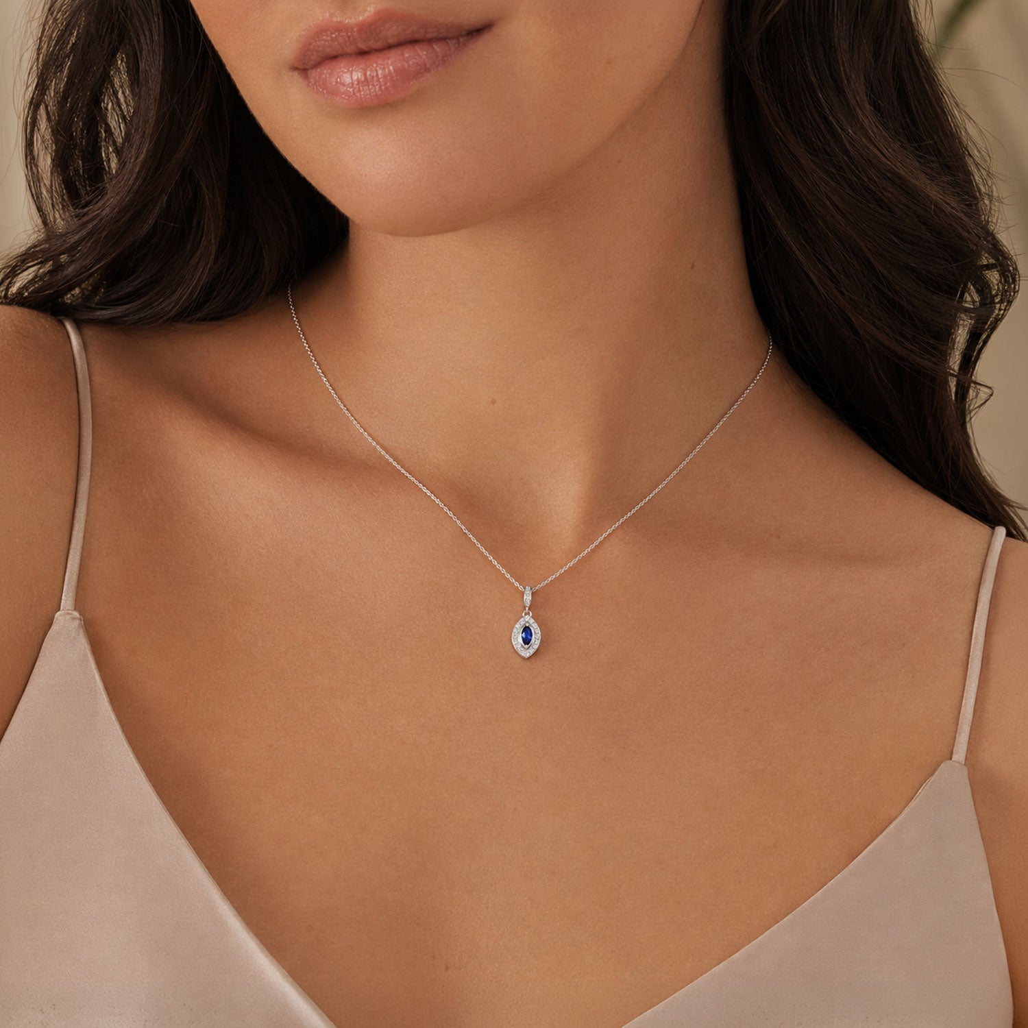 18ct White Gold Marquise Cut Sapphire And Diamond Pendant