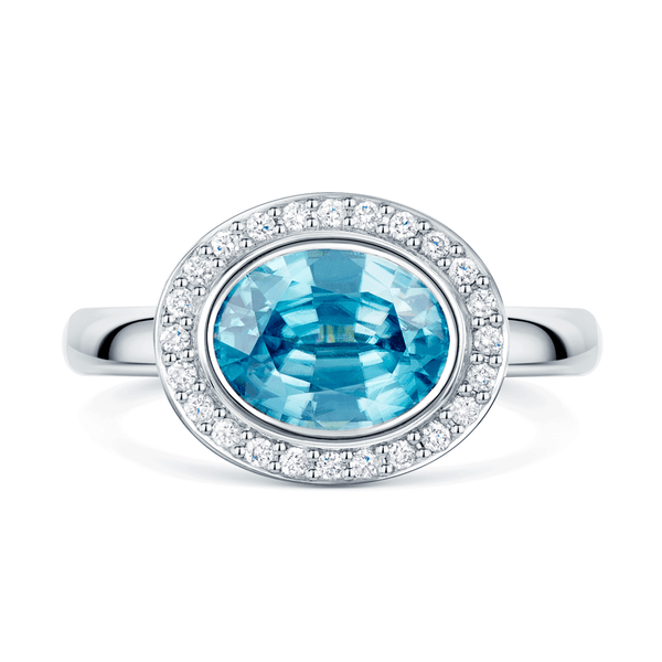 Berry's 18ct White Gold Oval Cut Blue Zircon And Round Brilliant Diamond Rub Over Halo Dress Ring - Berry's Jewellers