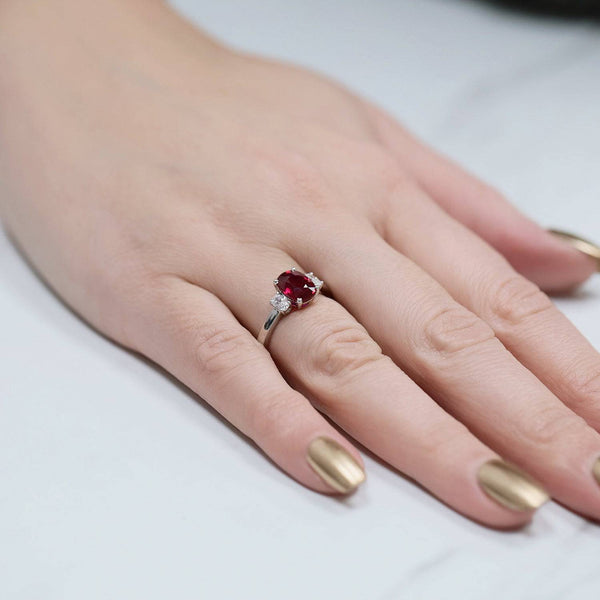 Berry's 18ct White Gold Ruby & Diamond Oval Three Stone Ring - Berry's Jewellers
