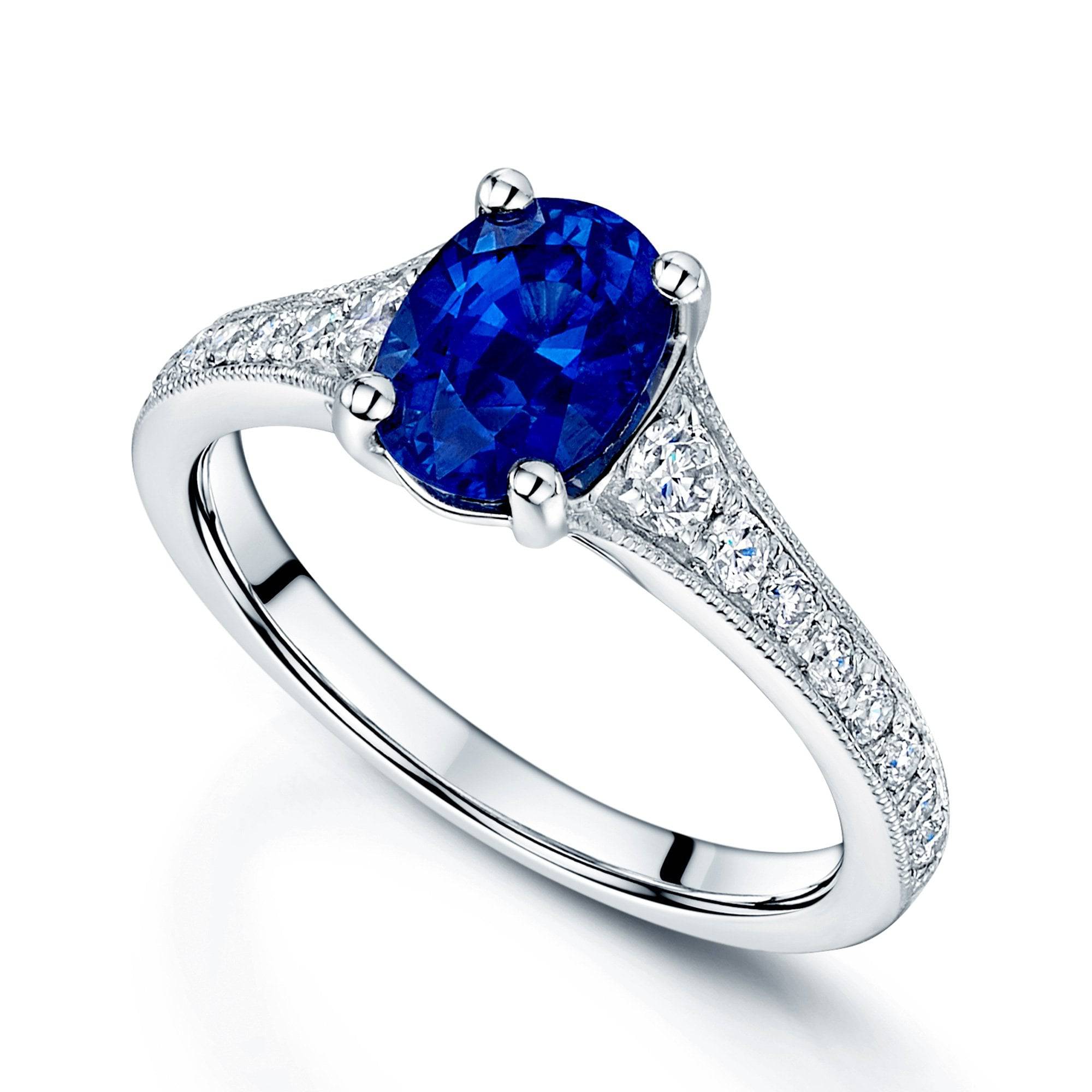 Platinum Oval Claw Set Sapphire Ring With Bead Edge Grain Set Diamond