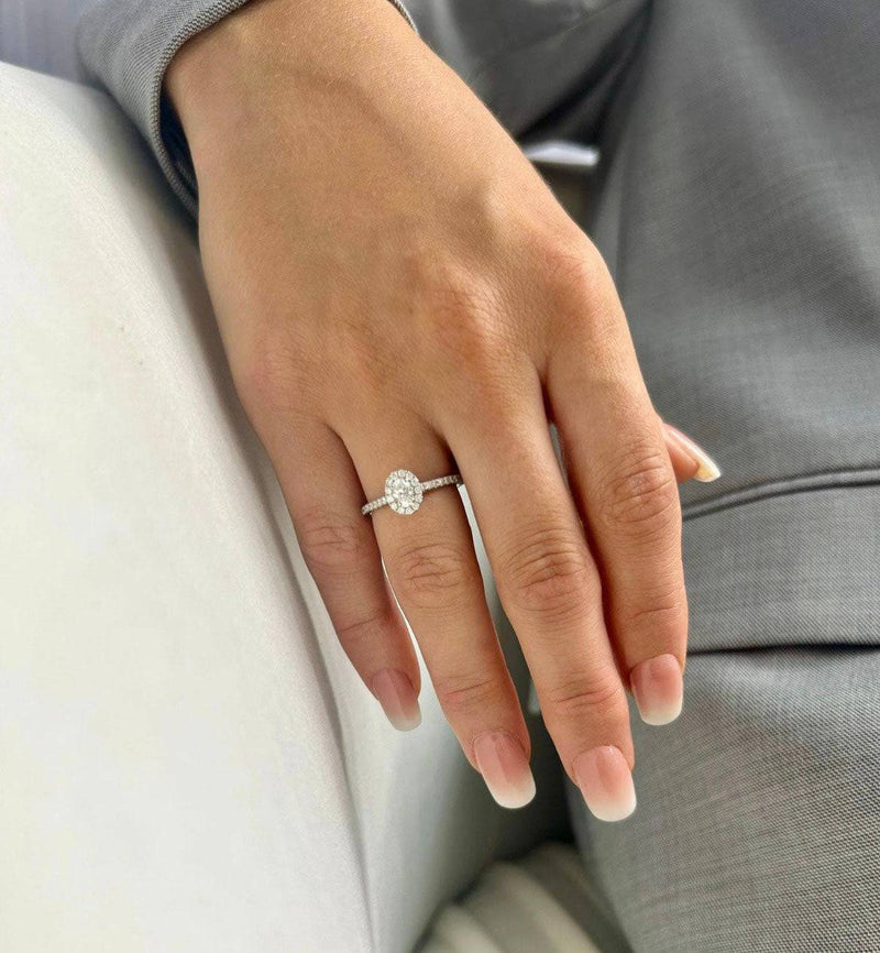 Platinum Oval Cut Diamond Halo Ring and Round Brilliant Diamond