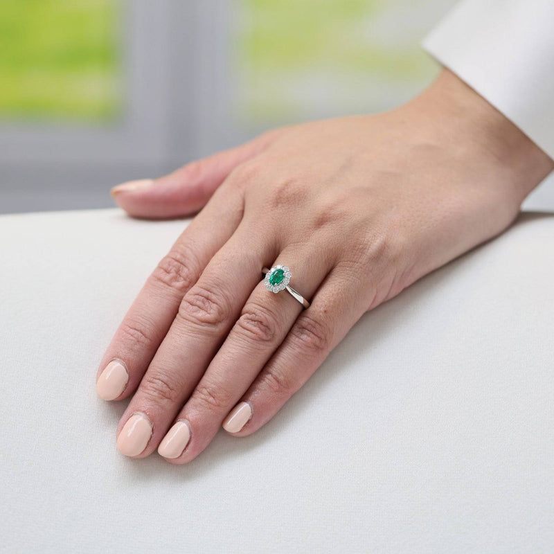 Berry's Platinum Oval Cut Emerald And Diamond Cluster Ring - Berry's Jewellers