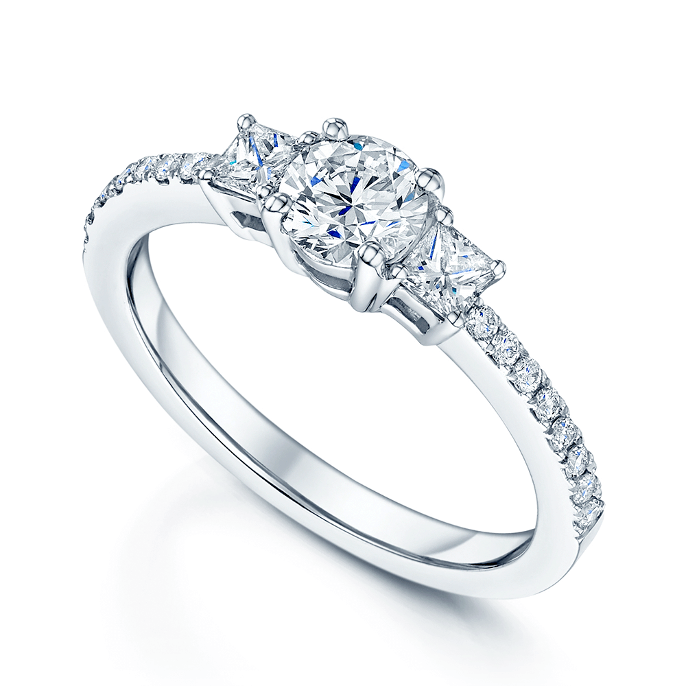 Platinum Round Brilliant And Princess Cut Diamond Three Stone Engageme