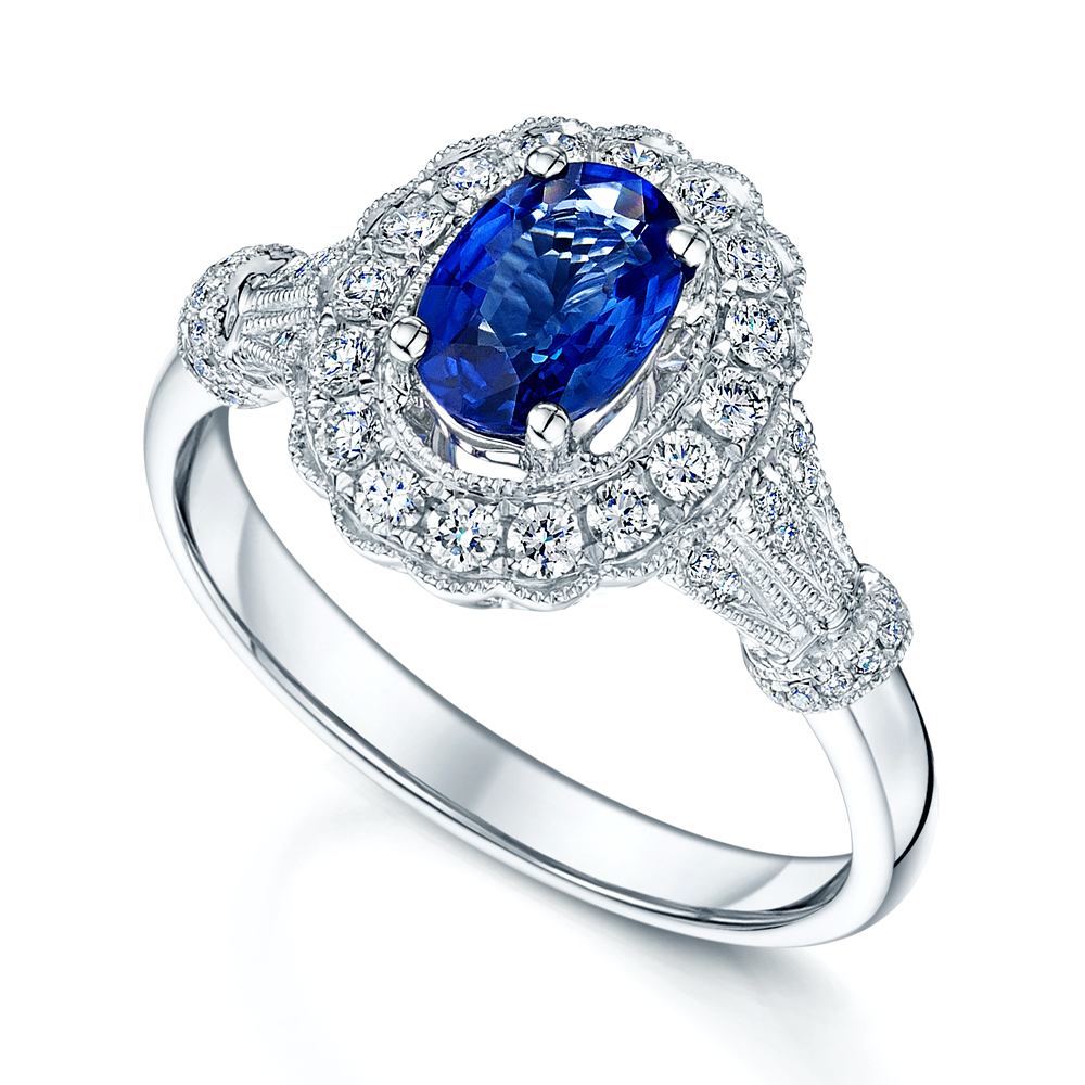 18ct White Gold Oval Sapphire & Diamond Set Surround Ring