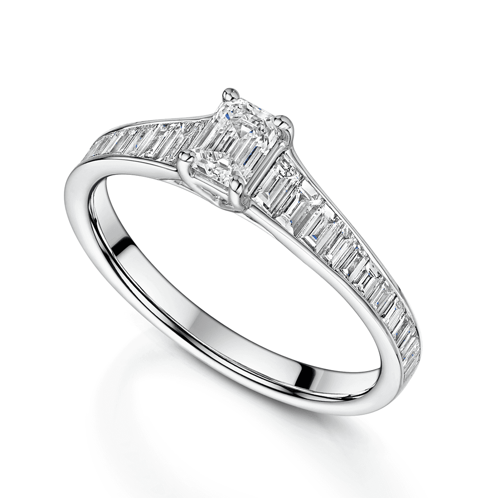 Platinum Emerald Cut Diamond Single Stone Ring With Baguette Cut Diamond Shoulders