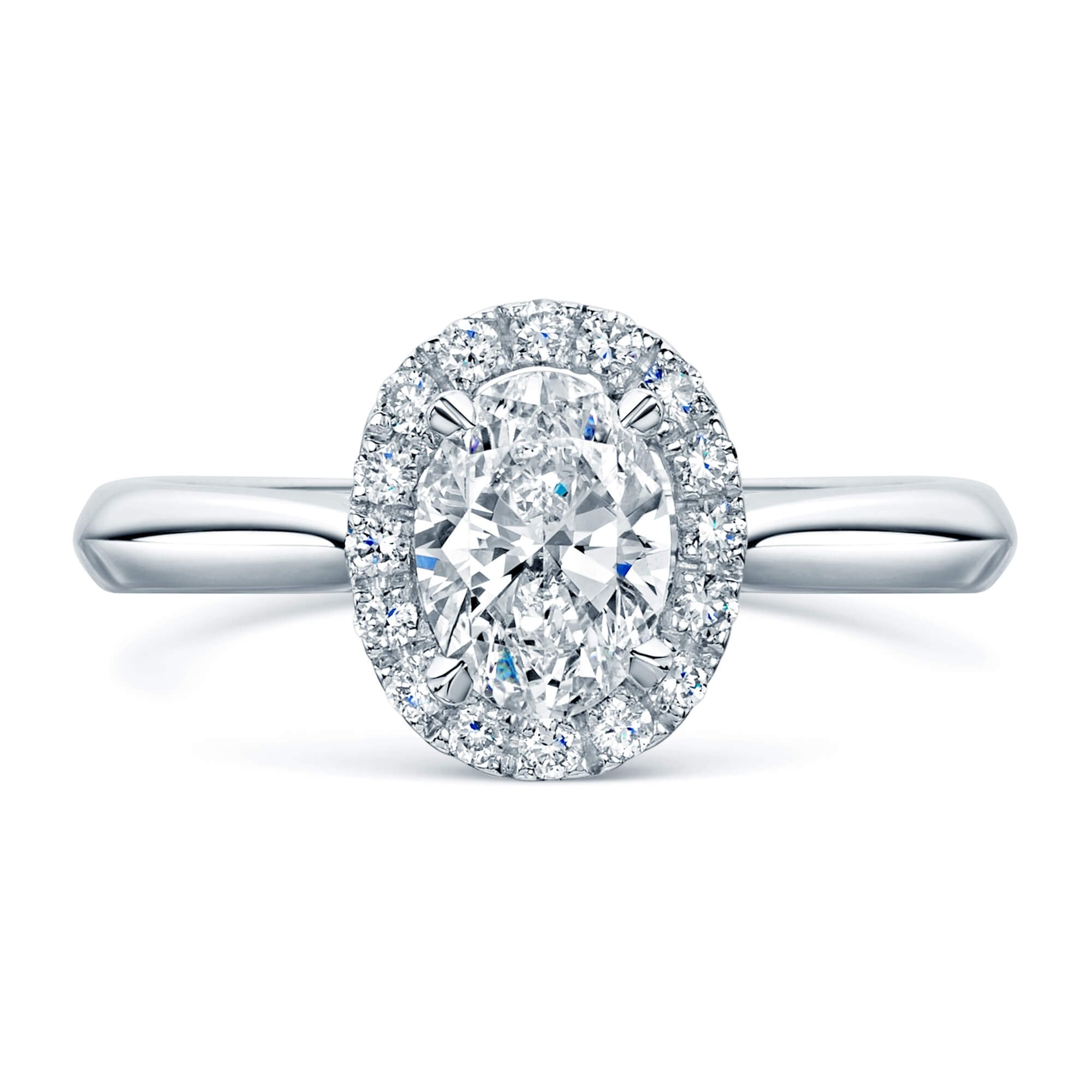 Platinum GIA Certificated Oval Diamond Ring With A Diamond Halo Surround