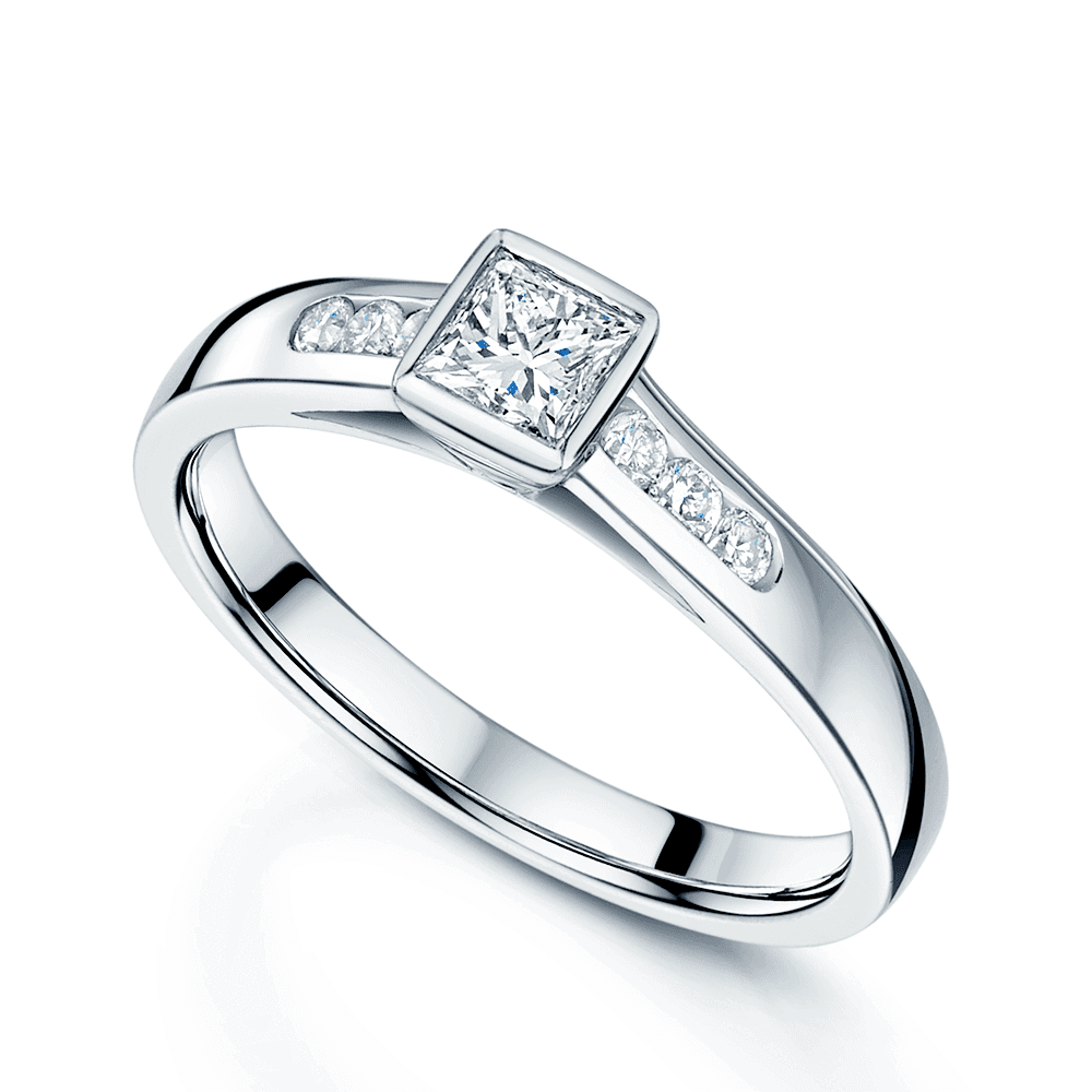 18ct White Gold Princess Cut Diamond Rub Over Set Solitaire Ring With Round Brilliant Cut Channel Set Diamond Shoulders